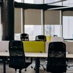 Contemporary office space with sleek furniture, ideal for teamwork and productivity.